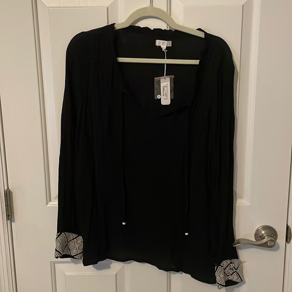 Black peasant top with embroidered cuffs